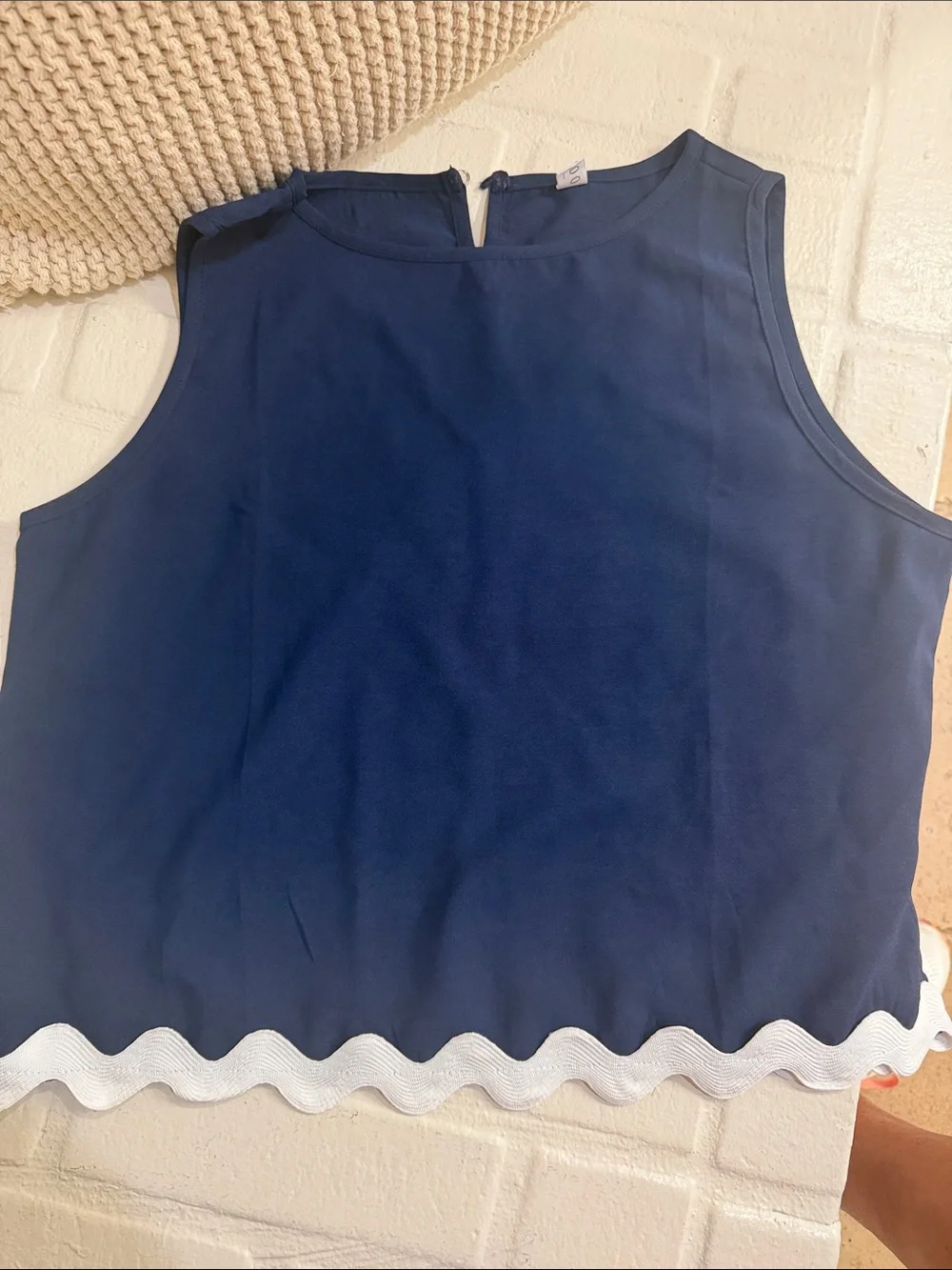 Scallop edge, sleeveless blouse